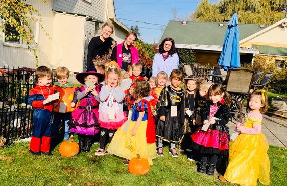 kid playing with teacher